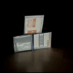 A gold fish swimming freely on the cubes. 